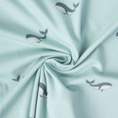 Tissu Jersey Coton Milo baleines sur fond Bleu ciel - Par 10 cm