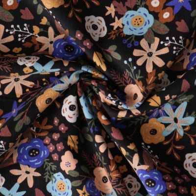Tissu Velours Côtelé  Liora fleurs Ocre sur fond Noir - Par 10 cm