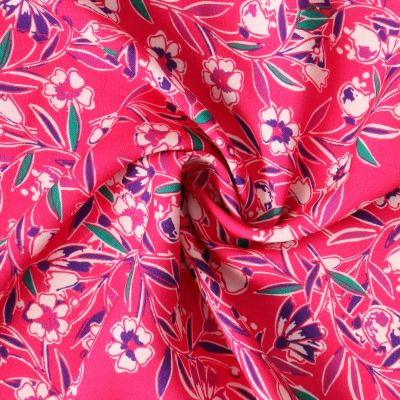 Tissu Viscose Rosa Bahia fleurs Blanches sur fond Rose fuchsia - Par 10 cm