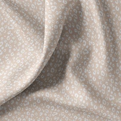 Tissu Coton imprimé léopard Kamar blanc sur fond Beige sable - Par 10 cm