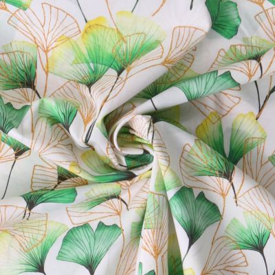 Tissu Voile de Coton feuilles Ginkara Dorées sur fond Blanc - Par 10 cm