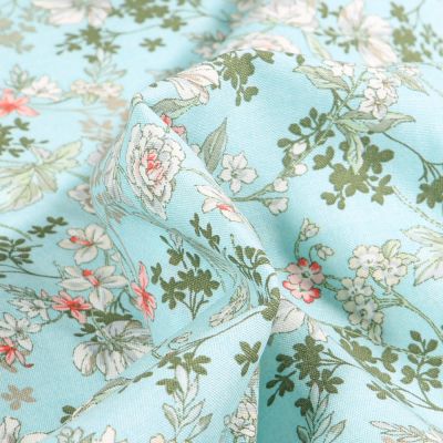 Tissu Viscose Arty Anaïs sur fond Bleu clair - Par 10 cm