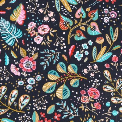 Tissu Coton Imprimé Arty Fleurs et feuilles sur fond bleu marine - Par 10 cm