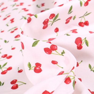 Tissu Coton enduit Cherry sur fond Blanc - Par 10 cm