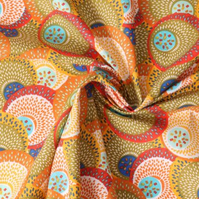 Tissu Popeline de Coton  Sahel rosaces stylisées sur fond Vert kaki clair - Par 10 cm