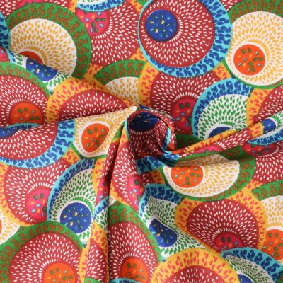 Tissu Popeline de Coton  Sahel rosaces stylisées sur fond Rouge - Par 10 cm