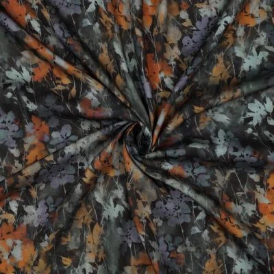 Tissu Viscose  Nina feuillage automnal Rouille sur fond Noir - Par 10 cm