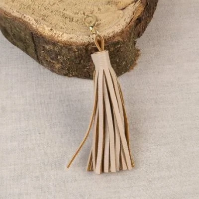 Pompon avec fermoir Beige