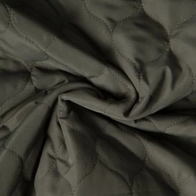 Tissu Doudoune matelassé Garance   sur fond Vert kaki foncé - Par 10 cm