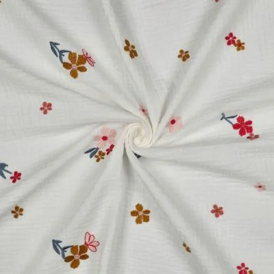 Tissu Double gaze de Coton Fleurs Brodés Zélyne ocre rouge sur fond Blanc - Par 10 cm