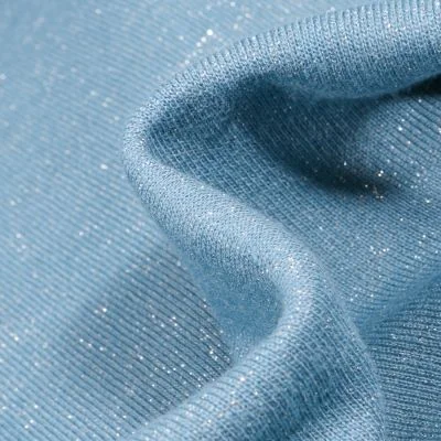 Tissu Sweat uni Pailleté sur fond Bleu - Par 10 cm