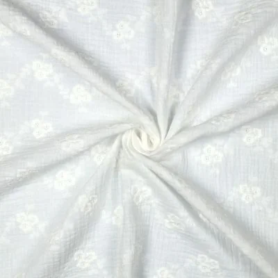 Tissu Double gaze de Coton brodé Fleurs sur fond Blanc - Par 10 cm