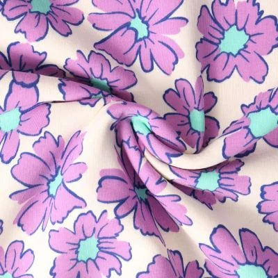 Tissu Sweat envers molletonné Cosmia fleurs Violettes sur fond Beige - Par 10 cm