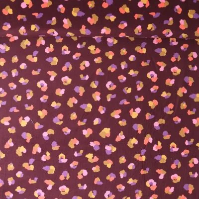 Tissu Velours milleraies Mila motif léopard multicolore sur fond Bordeaux - Par 10 cm
