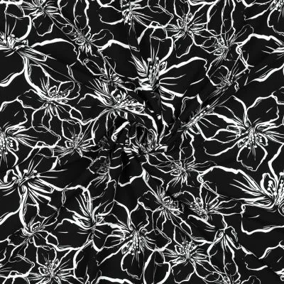Tissu Viscose EcoVero grandes fleurs Blanche sur fond Noir - Par 10 cm