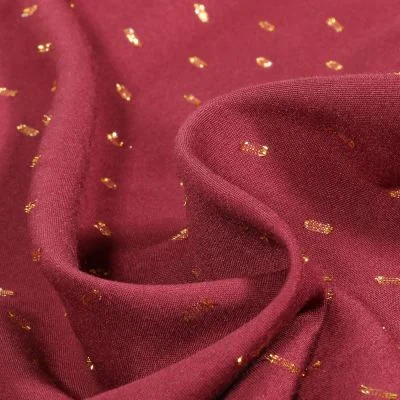 Tissu Viscose Pointilurex sur fond Bordeaux - Par 10 cm