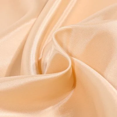 Tissu Doublure Pongé uni Rose saumon - Par 10 cm