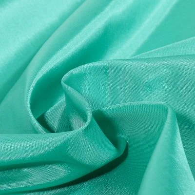 Tissu Doublure Pongé uni Bleu lagon - Par 10 cm