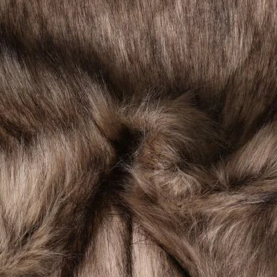 Tissu Fausse fourrure  poils long Ruth sur fond Marron - Par 10 cm