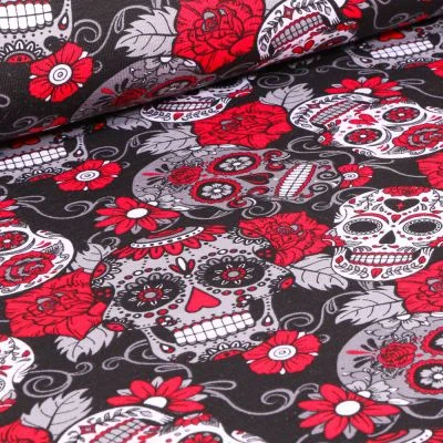 Tissu Jersey Coton Tête de morts rouge sur fond Noir - Par 10 cm