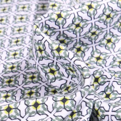 Tissu Jersey Coton Bio Motifs carreaux de ciment sur fond Blanc - Par 10 cm