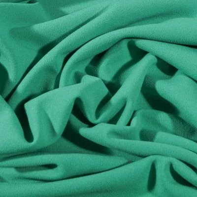 Tissu Crêpe Scuba extensible uni Vert - Par 10 cm