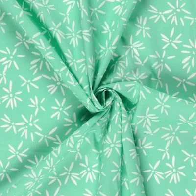 Tissu Coton extensible Pissenlit mode sur fond Vert menthe - Par 10 cm