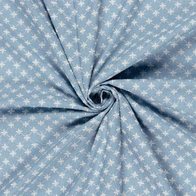 Tissu Chambray Coton Fleurs brodées sur fond Bleu clair - Par 10 cm