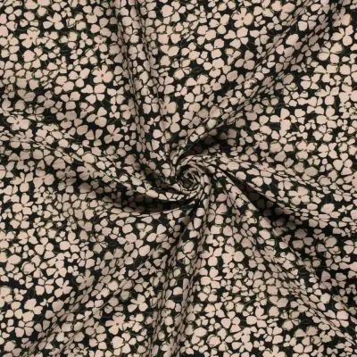 Tissu Crêpe de Viscose Ambrine fleurs Beige sur fond Noir - Par 10 cm