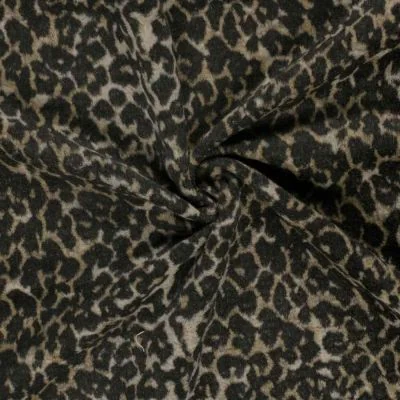 Tissu Jacquard toucher laine Eris léopard Noir sur fond Beige sable - Par 10 cm