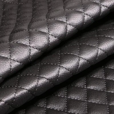 Tissu Simili cuir matelassé uni Chelsy Noir - Par 10 cm